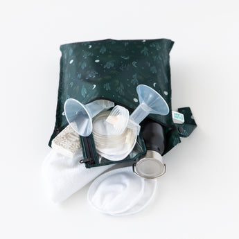 Bumkins Wet Bag: Starry Cactus holds a breast pump, tubes, pads, and a bottle on a white background.