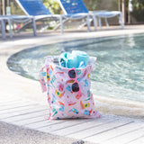 Bumkins Wet Bag + Travel Bag + Tote Set: Boots—perfect for on-the-go parents, fits towels, a bottle & pink sunglasses by the pool.