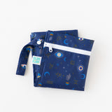 Bumkins Wet Bag: Evil Eye lays folded on a white background.