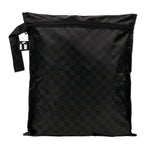 Roamio by Bumkins Wet Bag: Rich Black  features a black waterproof checkered design, zipper closure, and side handle.