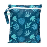 Bumkins Wet Bag: Blue Tropic is a zippered, dark blue waterproof bag with a side handle and blue leaf motif.
