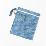 Roamio by Bumkins Wet Bag: Vintage Denim lays flat on a white background.