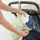 Pack baby clothes in the Bumkins Wet Bag + Wet/Dry Bag Set: Camp Gear—waterproof storage for stroller trips on the go.