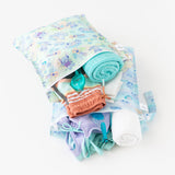 Bumkins Wet Bag 2 Pack: Disney Stitch Star-ring Up Trouble and waterproof accessories, displayed on a white background.