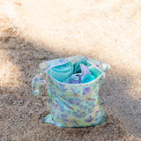 The Bumkins Wet Bag 2 Pack: Disney Stitch Star-ring Up Trouble keeps your essentials dry and sits easily on the sand.