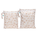 The Bumkins Wet Bag + Wet/Dry Bag Set: Palm Daze keeps you organized with stylish, reusable beige pouches featuring palm prints.