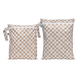 Bumkins Wet Bag + Wet/Dry Bag Set: Sand Check features 2 tan checkered waterproof bags with zipper closures.