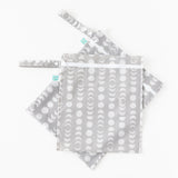 Bumkins Wet Bag + Wet/Dry Bag Set: Lunar Phase lays stacked on a white background.