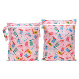Bumkins Wet Bag + Wet/Dry Bag Set in Boots print: 2 pink zippered bags with cowboy boots/hats pattern and side handles.