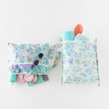 Bumkins Wet Bag + Wet/Dry Clutch Set: Disney Aloha Stitch holds sunglasses, sunscreen, and other swim essentials on a white background.