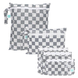 Bumkins Wet Bag + Wet/Dry Clutch + Clear Travel Bag 3 Pack Set in Charcoal Check, perfect for travel, shown on a white background.