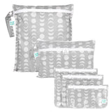 Bumkins Lunar Phase 3-pack set includes gray wet bags and clutch with white zippers—ideal for travel and packing essentials.