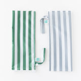 Bumkins Wet Bag Plus 2 Pack: Green + Gray Stripe lays folded on a white background.