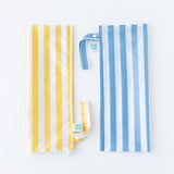 Bumkins Wet Bag Plus 2 Pack: Blue + Yellow Stripe lays folded on a white background.