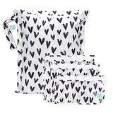 Bumkins Wet Bag + Clear Travel Bag 3 Pack Set: Hearts—ideal travel essentials for organizing or carrying wet items on the go.