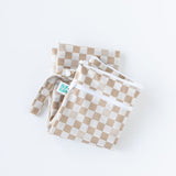 Bumkins Wet/Dry Bag: Sand Check is folded on a white background.