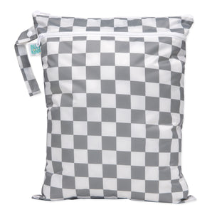 Bumkins Wet/Dry Bag: Charcoal Check is waterproof with two zippered compartments and a handle for odor-free storage of wet items.