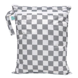 Bumkins Wet/Dry Bag: Charcoal Check is waterproof with two zippered compartments and a handle for odor-free storage of wet items.