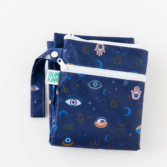 Bumkins Wet/Dry Bag: Evil Eye is folded on a white background.