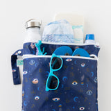 The Bumkins Wet Bag + Wet/Dry Bag Set: Evil Eye keeps essentials—sunglasses, water bottle, and more—organized and visible.