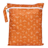 The Bumkins Wet/Dry Bag: Grounded features white arrows, an orange waterproof fabric, and a boho strap, shown on white.