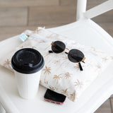 Stay organized on the go with Bumkins Palm Daze 3-Pack Set: Wet Bag, Wet/Dry Clutch & Clear Travel Bag—travel essentials!.