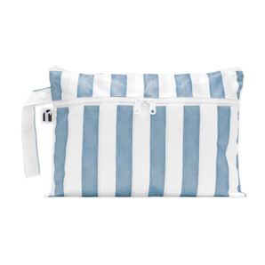 Roamio by Bumkins Wet/Dry Clutch: Nautical Stripe is a zippered waterproof pouch with two compartments and a blue & white striped pattern.