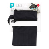 Bumkins Wet/Dry Clutch: Black is shown folded in its packaging.