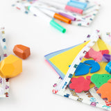 Close-up of Bumkins Clear Travel Bag 3 Pack: Mickey & Friends Varsity filled with colorful art supplies on a white background.