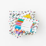 Bumkins Clear Travel Bag 3 Pack: Mickey & Friends Varsity are stacked on a white background, filled with markers and other art supplies.