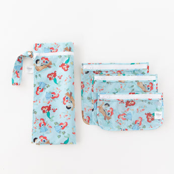 Bumkins Clear Travel Bag 3 Pack: Disney Princess Ariel lays on a white background next to another bag with a matching print.