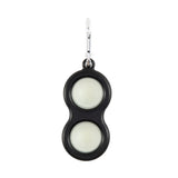 The Fat Brain Toy Co Simpl Dimpl keychain has two lenses like binoculars and is a glow-in-the-dark fidget toy.