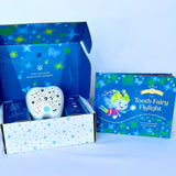 The Tooth Fairy Flylight Box Set by Tooth Fairy Flylight includes a storybook and projector nightlight in a starry box for the lost tooth tradition.