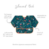 Infographic of Bumkins Sleeved Bib: Bumkins signature waterproof fabric, catch-all pocket, adjustable tie neck closure, 6-24 months.
