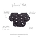 Infographic of Bumkins Sleeved Bib: Bumkins signature waterproof fabric, catch-all pocket, adjustable tie neck closure, 6-24 months.