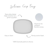 Infographic of Bumkins Silicone Grip Tray: 100% food-safe platinum silicone, strong suction base, open plate design, easy to clean.