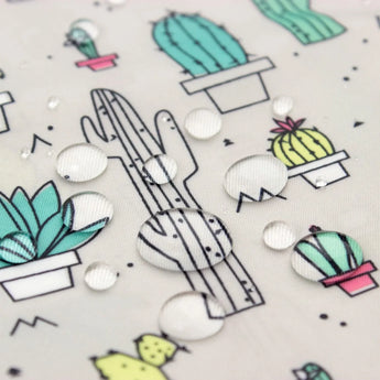 Close-up of water droplets on Bumkins Wet Bag: Cacti.