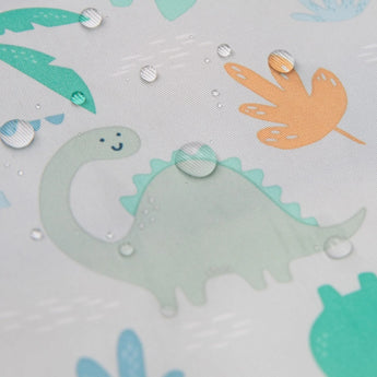 Close-up of water droplets on a Bumkins SuperBib® 3 Pack: Hangry, Dinosaurs, Blue Tropic.