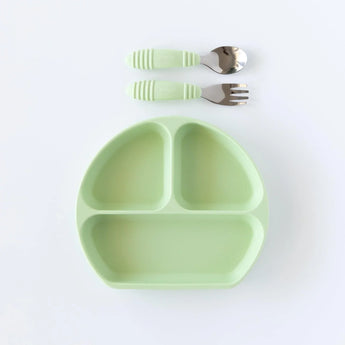 Bumkins Silicone Grip Dish: Sage sits below a matching spoon and fork set on a white background.