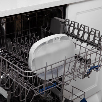 Bumkins Silicone Grip Dish with Lid (5 Section): Marble sits in the top rack of an open dishwasher.