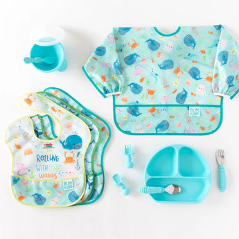 Bumkins Ultimate Gift Set - Ocean Life & Whale Tail includes two kinds of bibs, a bowl with spoon, two sets of utensils, and a silicone dish.