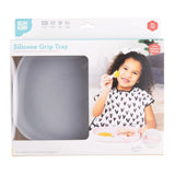 Bumkins Silicone Grip Tray: Gray in a white packaging box with a photo of a child and a clear window partially displaying the dish.