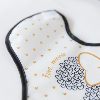 Close-up of a Bumkins SuperBib® 3 Pack: Love, Minnie, laid flat on a white background.