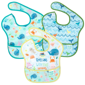 Bumkins SuperBib® 3 Pack: Rolling With the Waves includes 3 waterproof bibs with sea-themed designs, front pocket, & hook-and-loop closure.