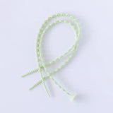 Bumkins Silicone Accessory Tether 2-Pack: Sage rests overlapped on a white background.
