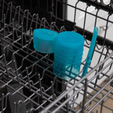 Bumkins Silicone Straw Cup with Lid: Blue sits in the top rack of an open dishwasher.