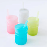Four cups with straws, including Bumkins Silicone Straw Cup with Lid: Blue, sit on a white background.