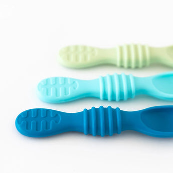 Close-up of Bumkins Silicone Dipping Spoons 3 Pack: Gumdrop on a white background, with focus on the textured handles.