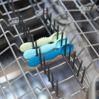 Bumkins Silicone Dipping Spoons 3 Pack: Gumdrop sits in the top rack of an open dishwasher.