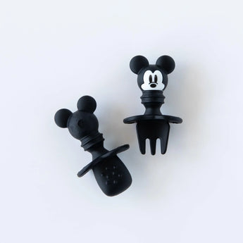 Bumkins Silicone Chewtensils®: Mickey Mouse are displayed on a white background with one face-down, showcasing sensory bumps on the back.